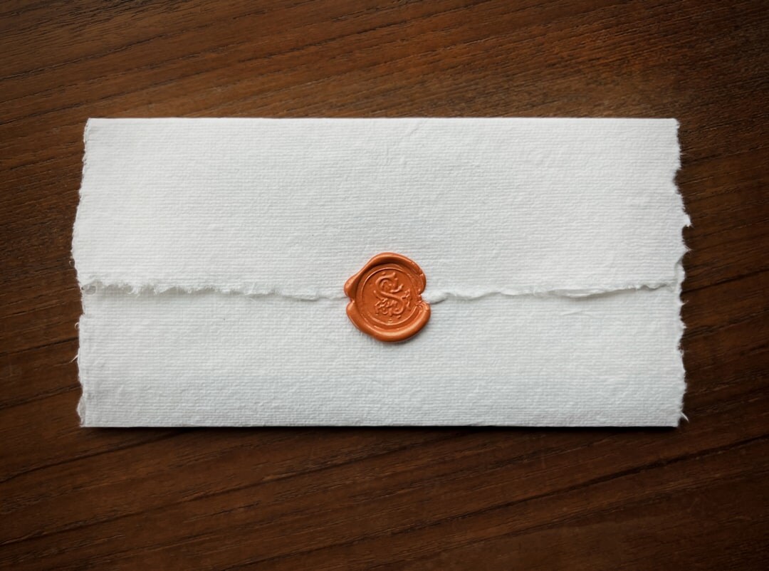Leather folder with legal documents and a wax seal